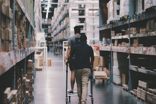A photo of people managing logistics in a warehouse